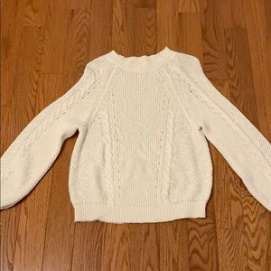 white cable knit sweater